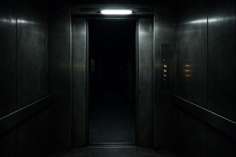 dimly lit elevator in an Asian apartment building at night